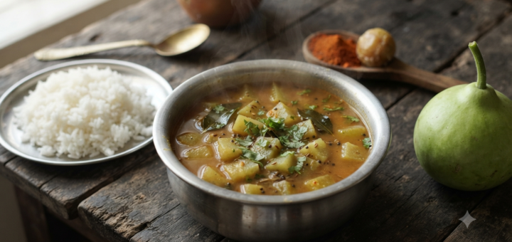 Lauki sambar recipe simmering in a steel pot with soft bottle gourd cubes, toor dal and a curry leaf tempering
