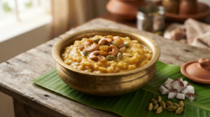 Sweet pongal with coconut milk topped with cashews and raisins